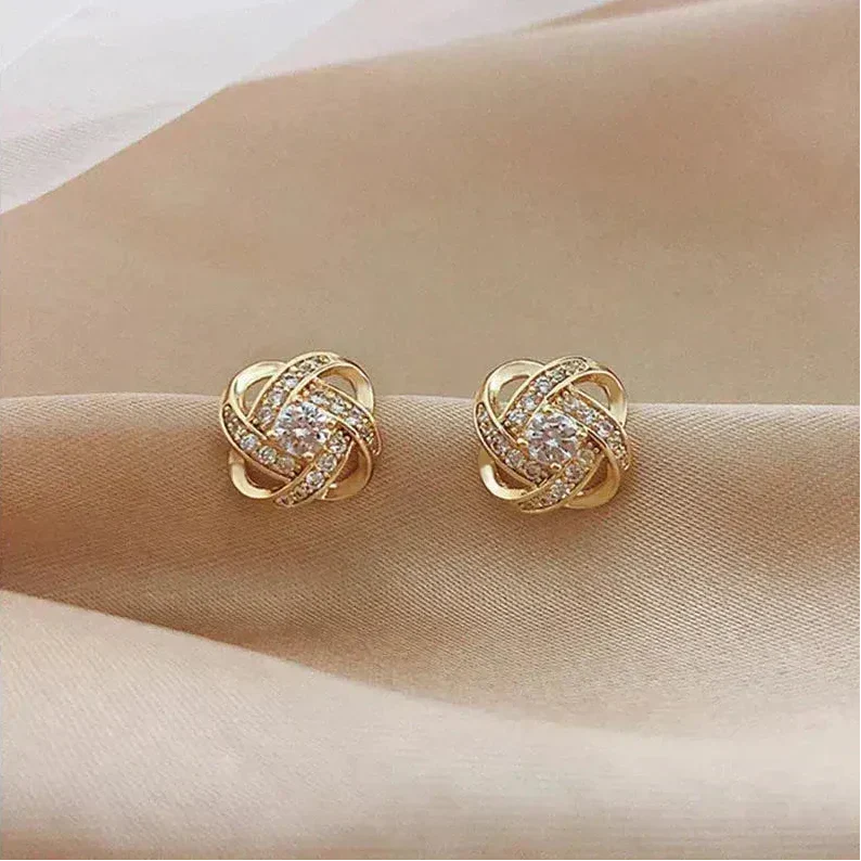 Gouden Spiraal Oorbellen met Kristallen