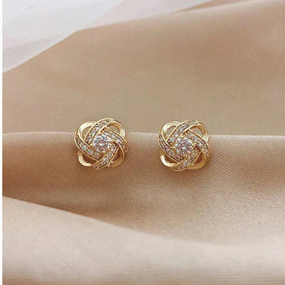 Gouden Spiraal Oorbellen met Kristallen